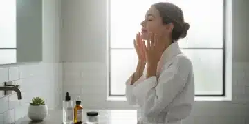 Woman applying serum for humid weather skincare routine